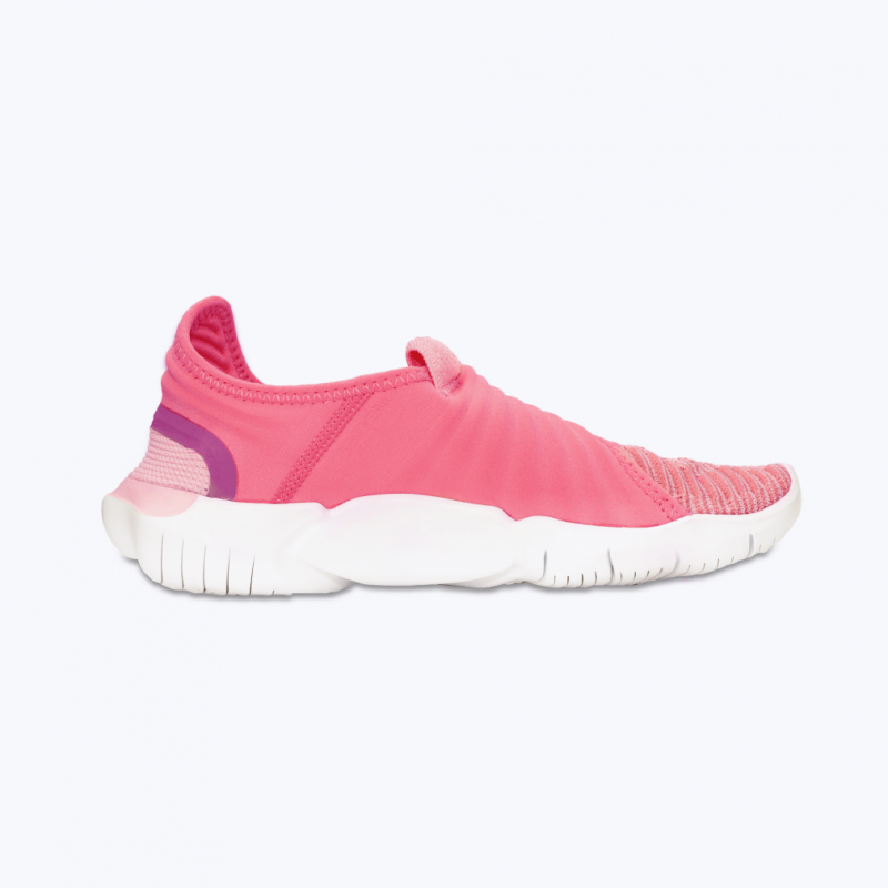One pink sneaker shoe isolated white